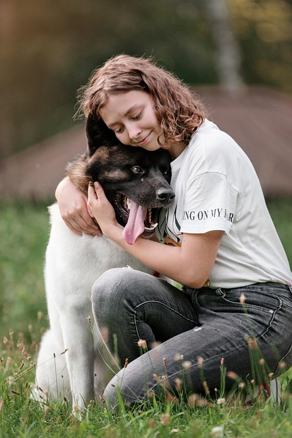 Cat and owner sharing a peaceful moment during an animal-assisted therapy awareness session